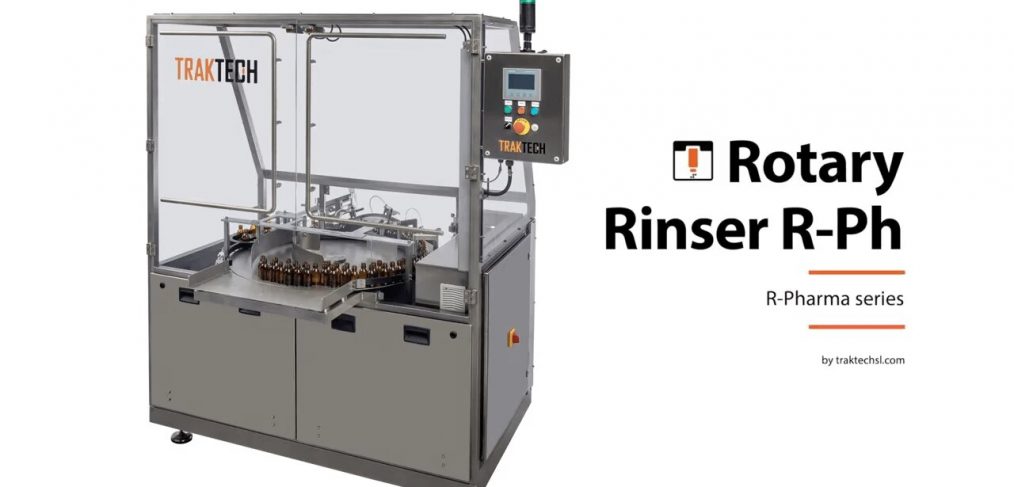 Foto de la máquina enjuagadora rotativa R-PH para el lavado de envases de vidrio o plástico en la industria farmacéutica.